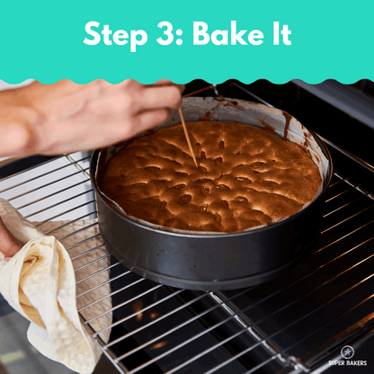 Person testing baked cake with a toothpick in oven using Date Cake Baking Mix in a round pan